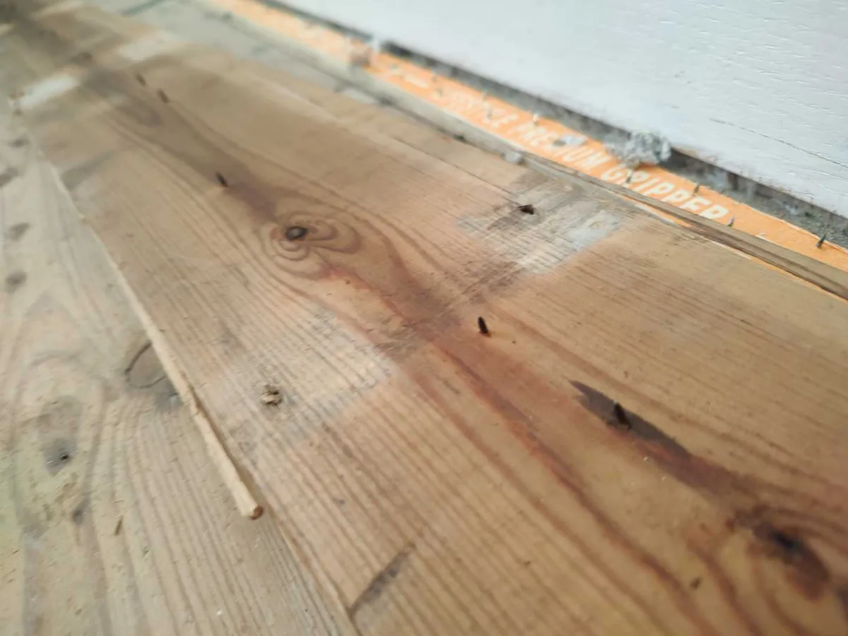 bedroom floorboards relaid and area reinstated after repair works completed