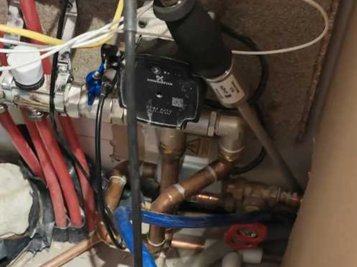 underfloor heating manifold and primary pipework during leak detection investigation