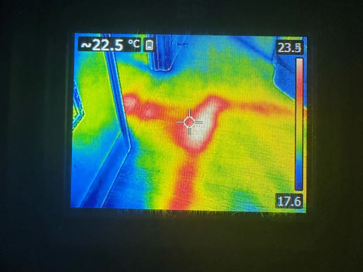 thermal imaging camera screen showing pipework heat signature during leak detection