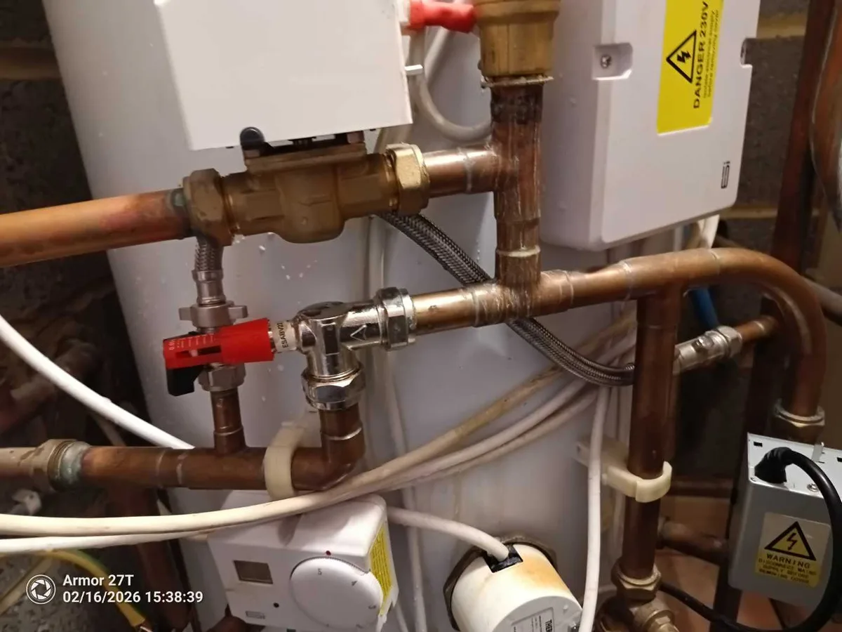 replacement filling loop valve and braided hose fitted to heating system as repair completed