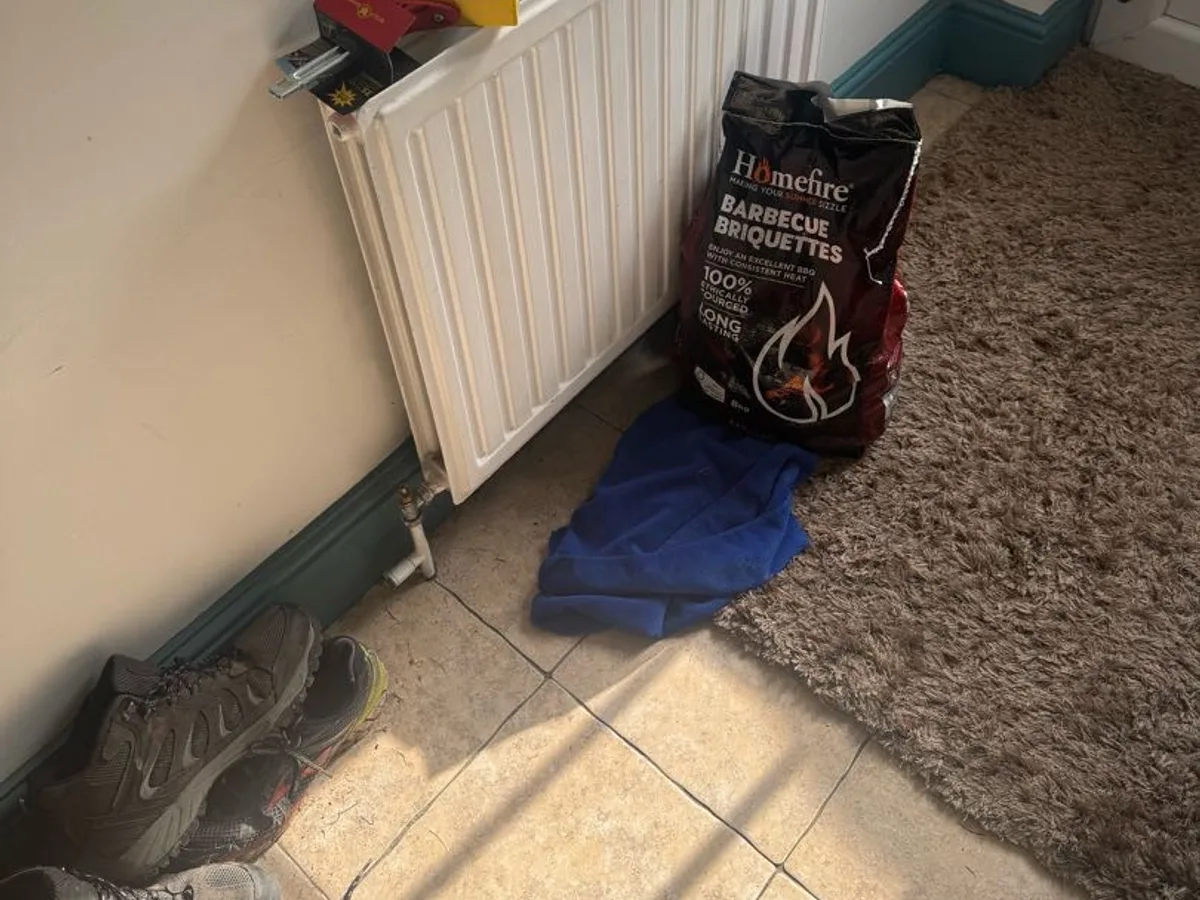 radiator and surrounding floor area before leak detection works started