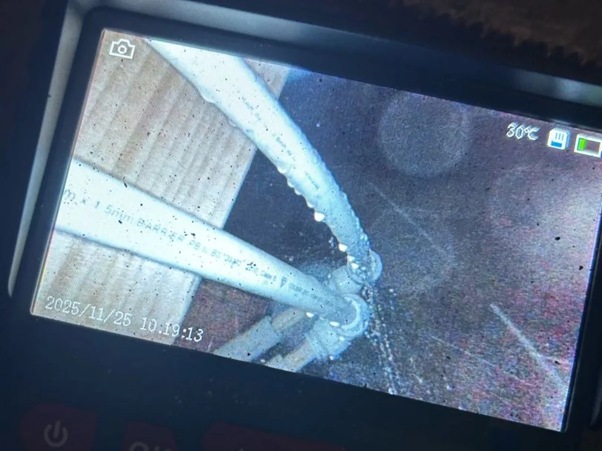 leak located at rodent-chewed speedfit elbow viewed on endoscope camera screen