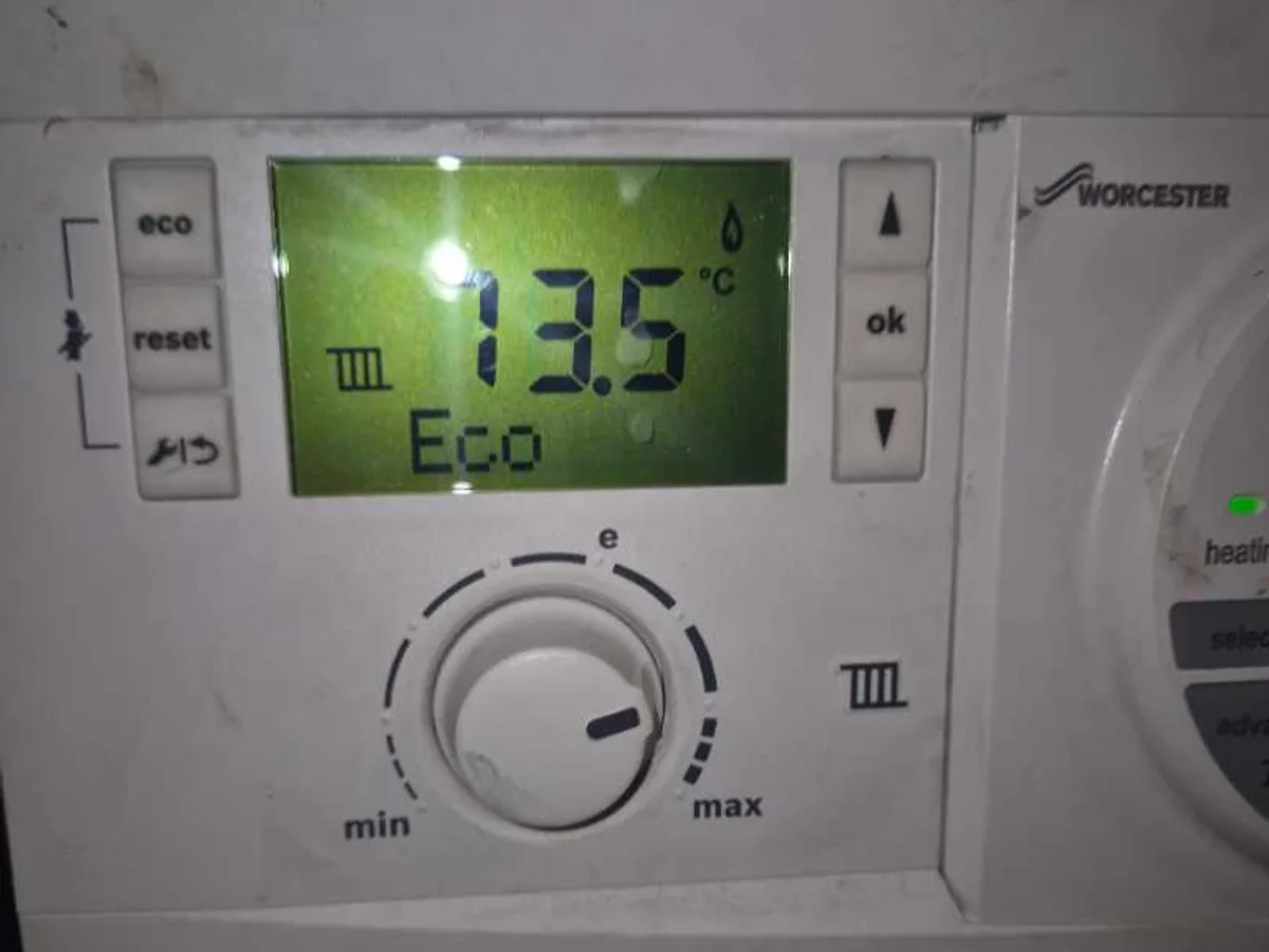 boiler control panel displaying normal temperature reading after works completed and system restored