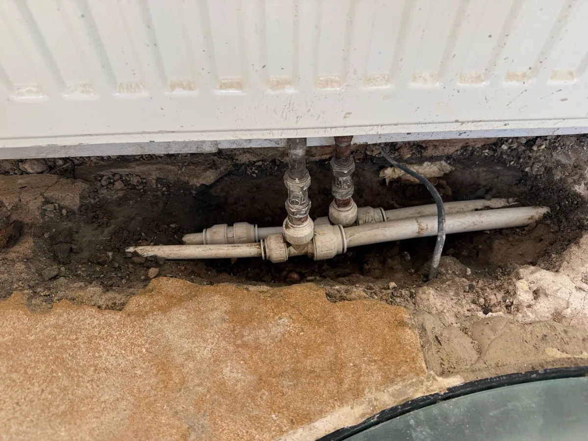 leak found at underfloor heating pipework beneath radiator after concrete floor excavated