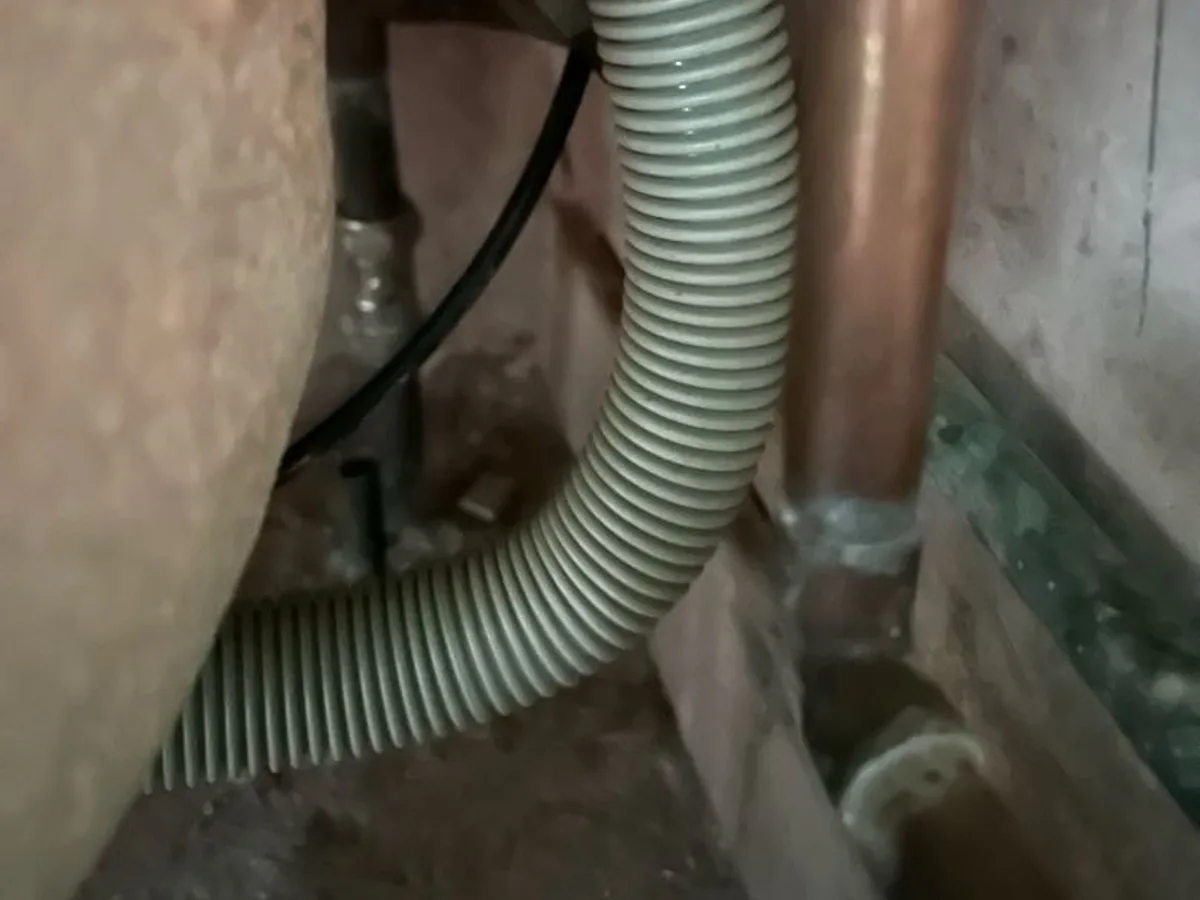 leak located at abandoned hot water pipework beneath bath with ballofix isolation valve