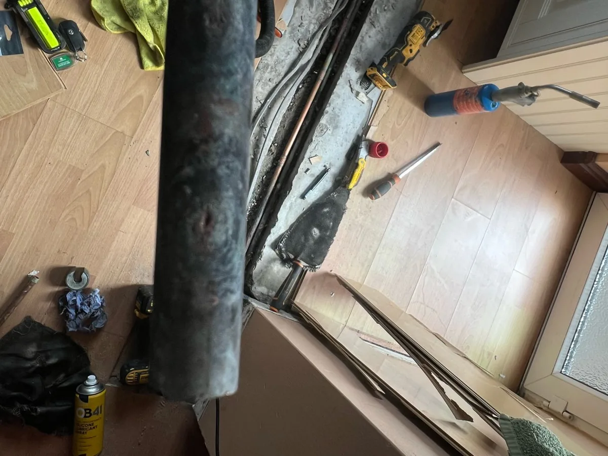 leak located at heavily corroded section of copper pipe removed from kitchen floor