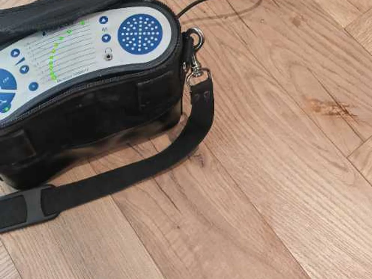 tracer gas analyser placed at base of kitchen units during leak detection survey