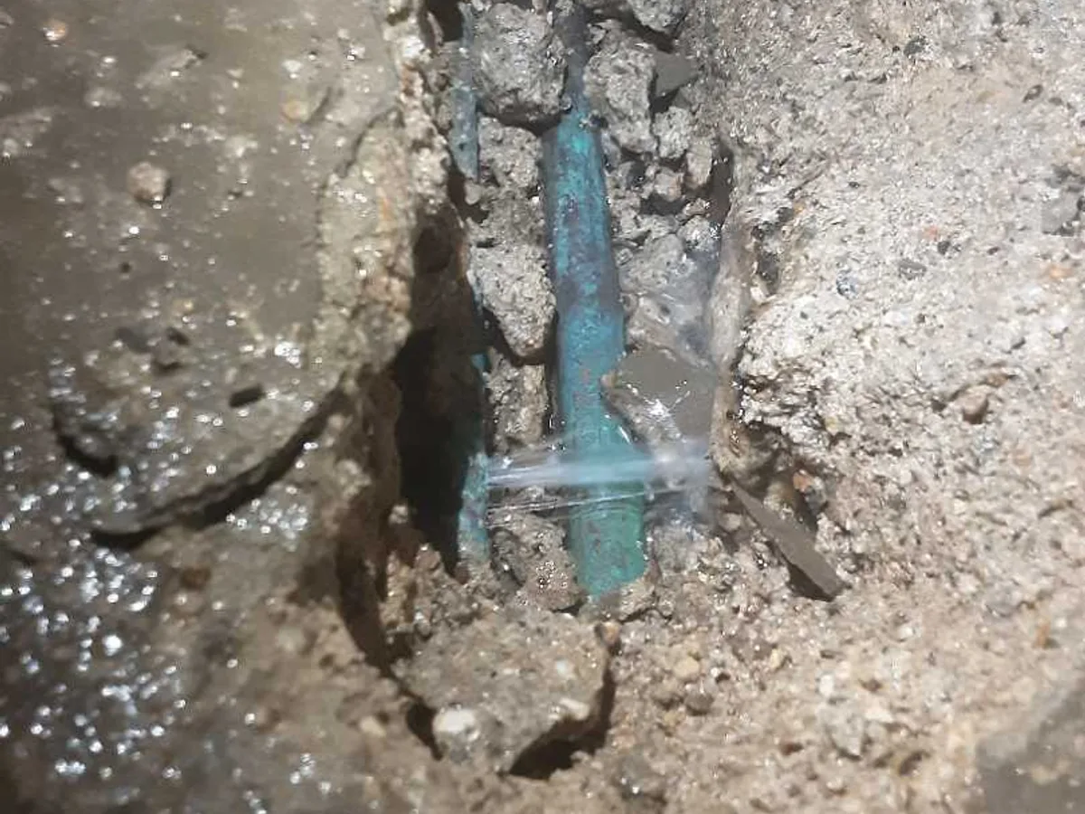 leak located at corroded 15mm copper cold water pipe embedded in broken concrete floor