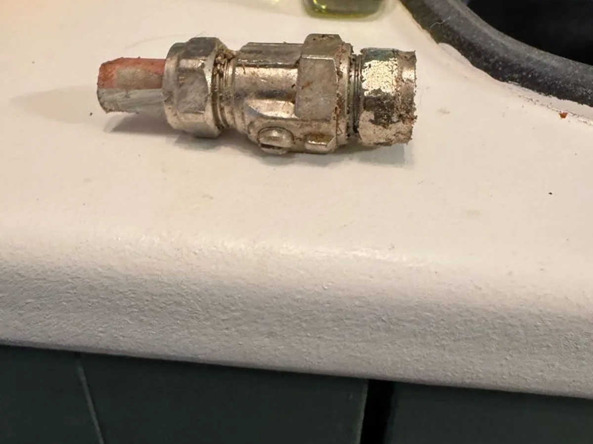 failed 15mm compression joint removed from kitchen floor after repair completed