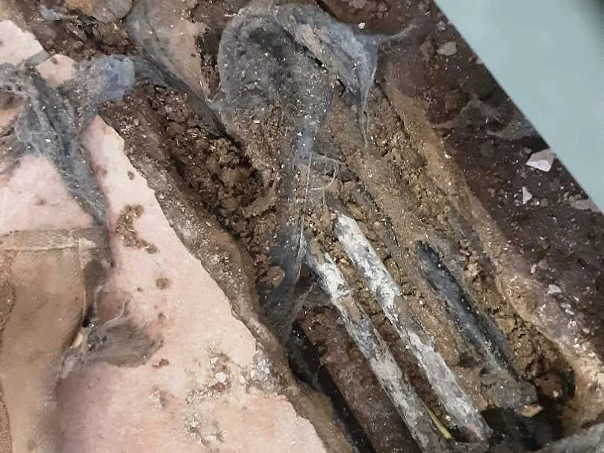 leak located at damaged 22mm copper pipework exposed beneath kitchen concrete floor