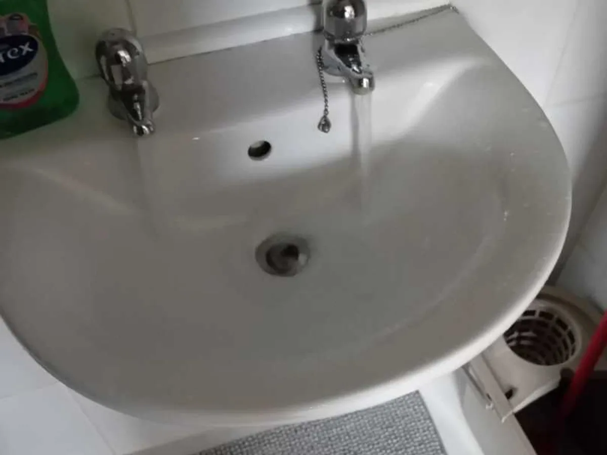 bathroom sink running freely after works completed following mains repair and pipework flush