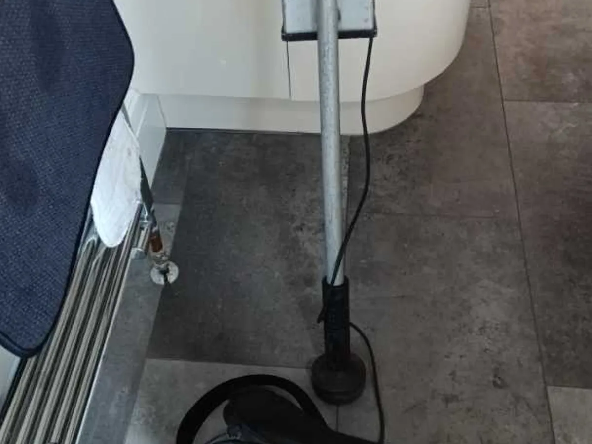 ground microphone and acoustic receiver unit in bathroom during leak detection survey