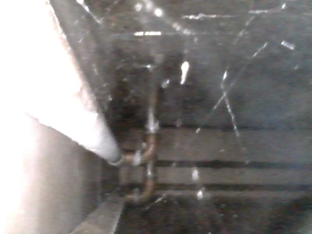 endoscope camera view beneath kitchen unit floor during leak detection survey