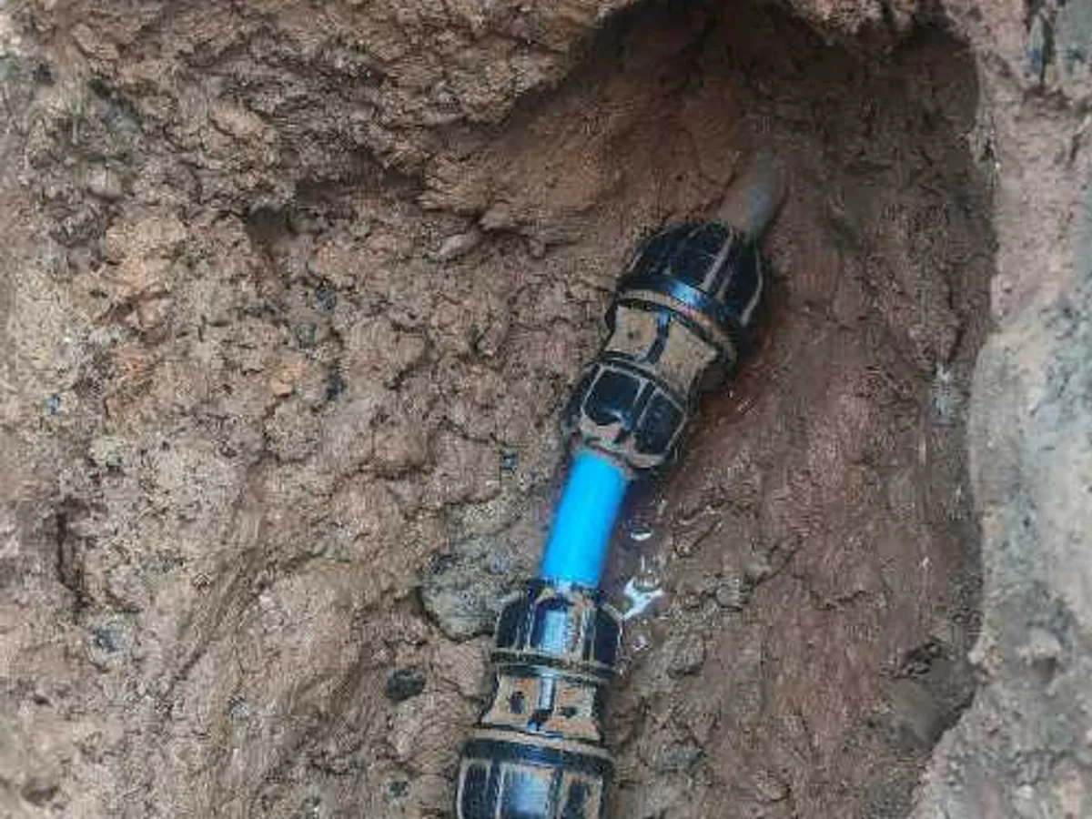 leak located at failed transition couplers on deteriorated lead supply pipe exposed in excavation