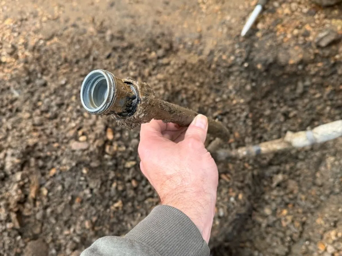 leak found at corroded 25mm to 20mm reducer fitting removed from underground mains supply