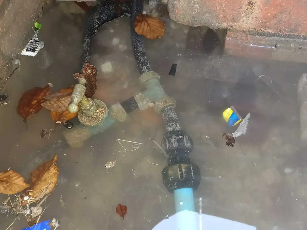 fault exposed at submerged 25mm mains pipework and compression fittings inside flooded access chamber