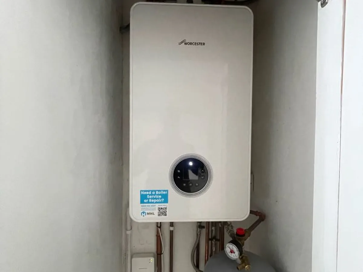 combination boiler in utility room cupboard inspected during leak detection survey