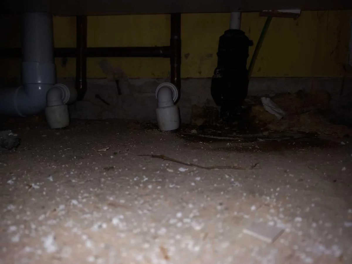 endoscopy camera view beneath kitchen floor void during leak detection