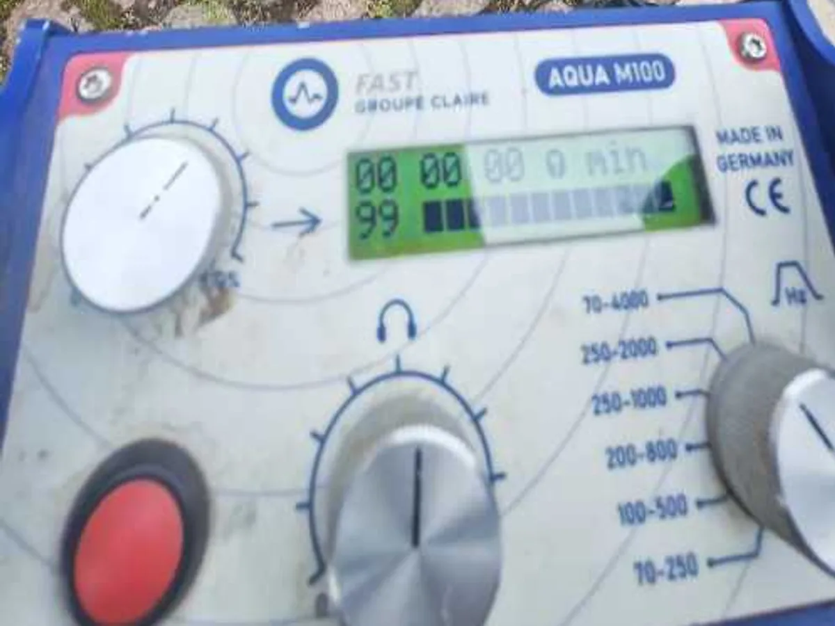 acoustic correlator unit with probe marker on cobbled courtyard during leak detection