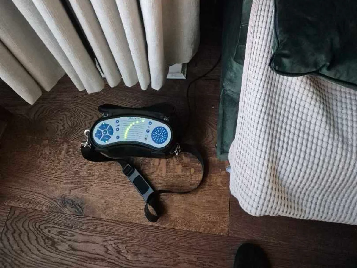 tracer gas detector placed on floor at skirting board during leak detection survey