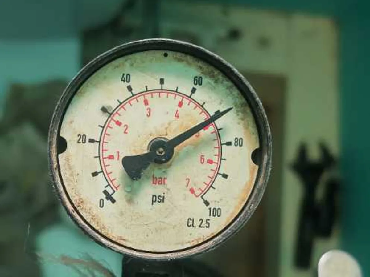 pressure gauge reading on test rig during post-repair pressure test — during leak detection
