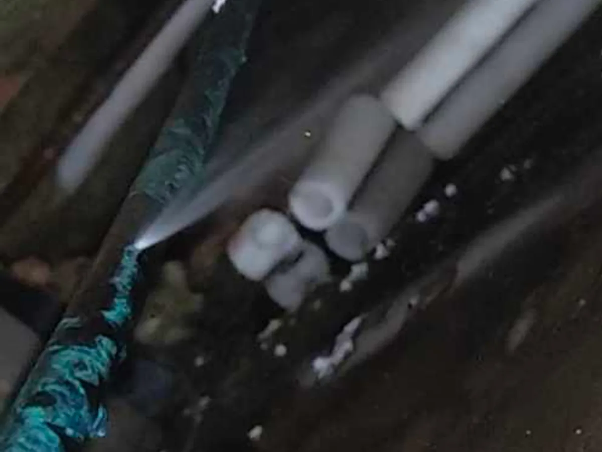 leak located at exposed pipework in void beneath ground floor tiles