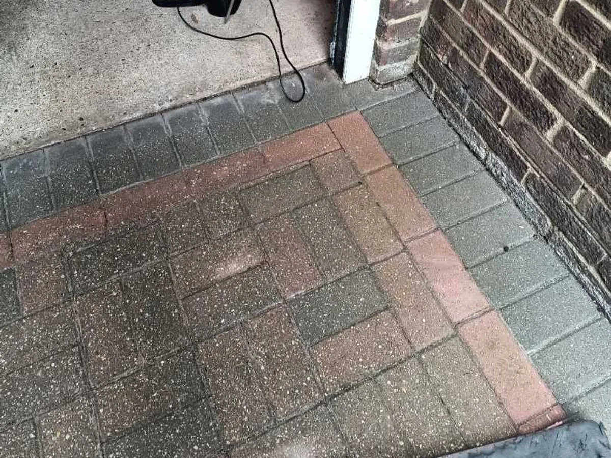 gas detector unit placed at garage threshold during leak detection investigation